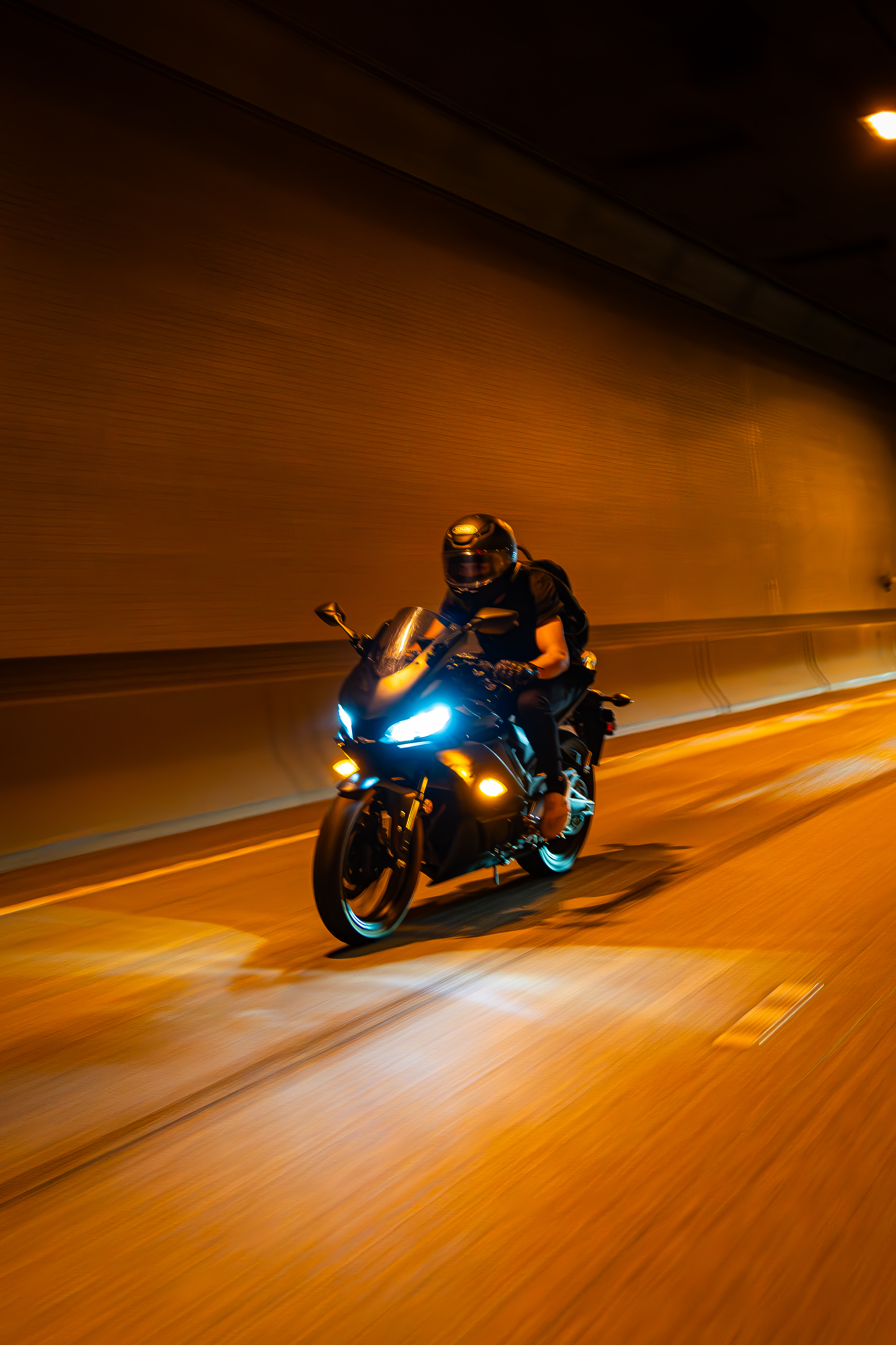 Motorcycle on open highway with scenic backdrop